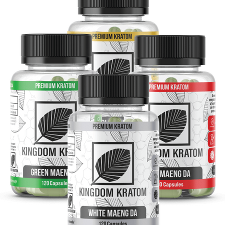 Four bottles of Kingdom Kratom capsules, each labeled with a different strain name: Green Maeng Da, Red Maeng Da, White Maeng Da, and Yellow Maeng Da.